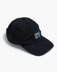 A slightly worn black cotton dad hat from the brand Mother, featuring "Mother" embroidered in white on the front, rests on a pristine white background. Product Name: Hats Off.