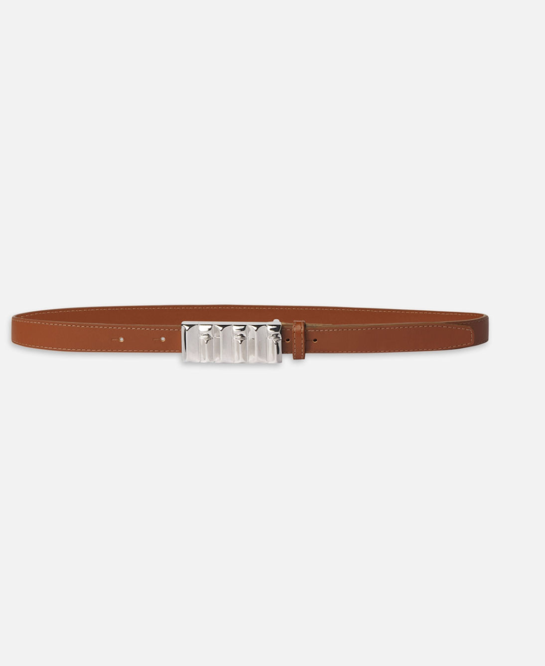 The Sculptural Belt by FRAME is made from sustainable leather. It features a distinctive silver rectangular buckle with a wavy design and displays visible stitching along the edges in a rich brown.