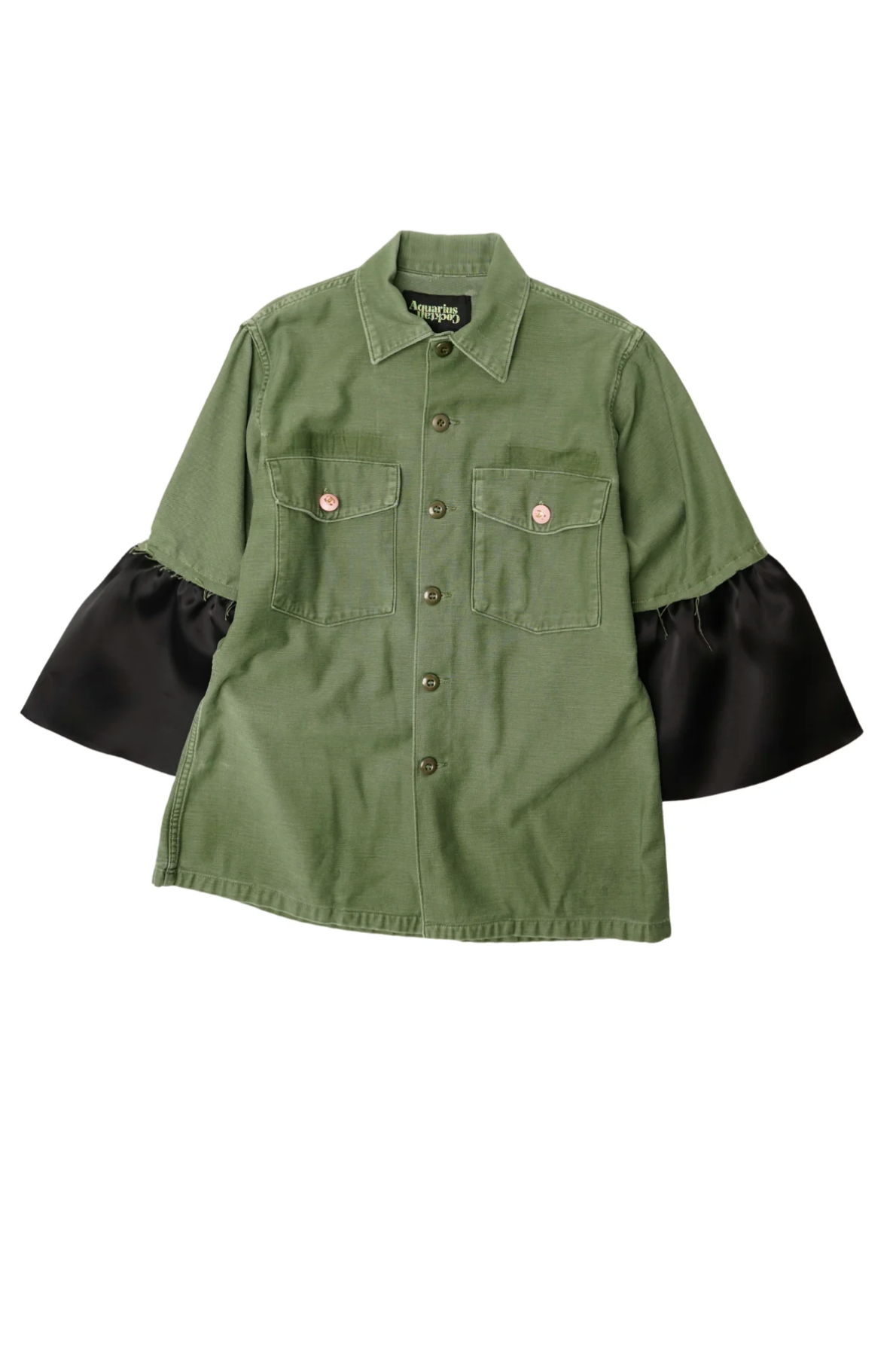 The Hooper Suiting Cuff Army Jacket by Aquarius Cocktail features a green button-up design, designer buttons, chest pockets, and statement black flared sleeves with ruffle cuffs.
