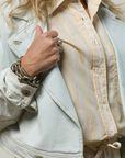 Bare Line Stripe Cissa Tunnel Top with visible bracelets and rings, styled by Bungalow Furniture & Accessories.