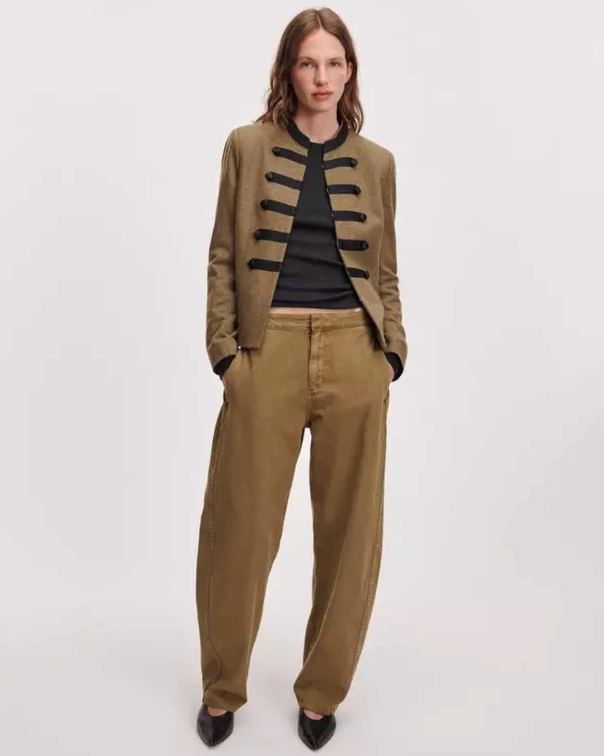 Khaki Rag &amp; Bone Mercer Regalia blazer styled with black shirt, loose khaki pants, and pointed black shoes.