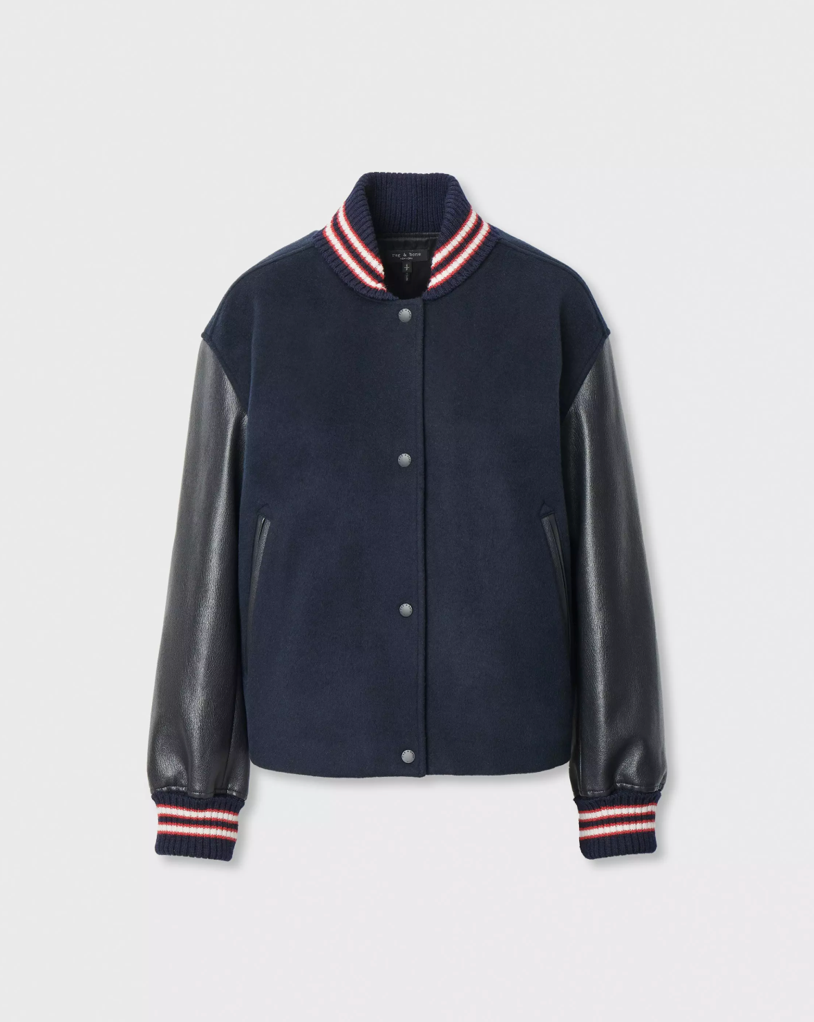 Scarlet varsity jacket with black faux leather sleeves and striped cuffs by Rag &amp; Bone, laid flat.