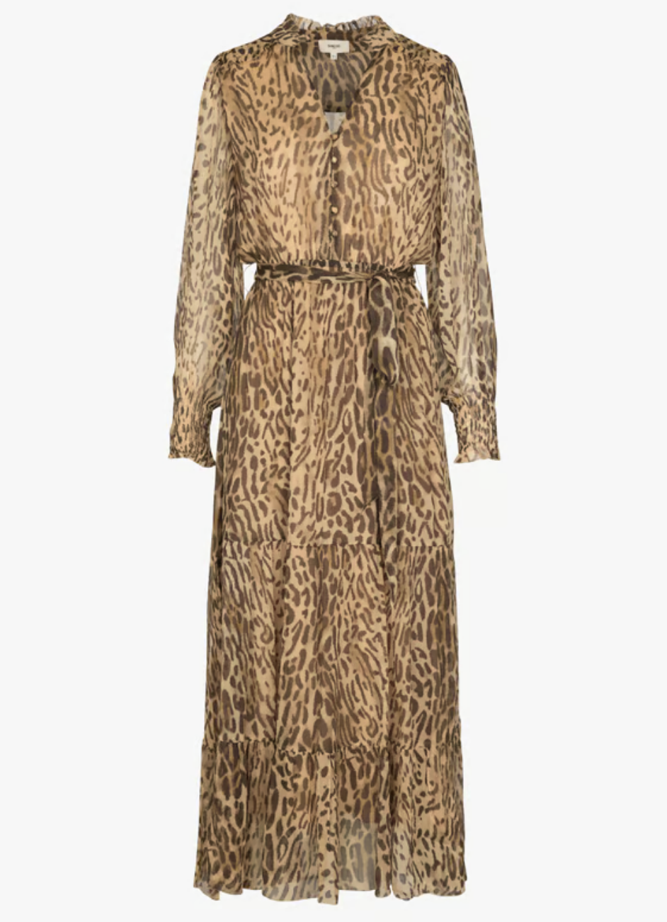 The Cosmos Dress by SUNCOO is a loose-fit, long-sleeve, floor-length chiffon dress in tan and brown leopard print, featuring a belted waist, ruffled collar, and tiered skirt. Made from 100% viscose; hand wash recommended.