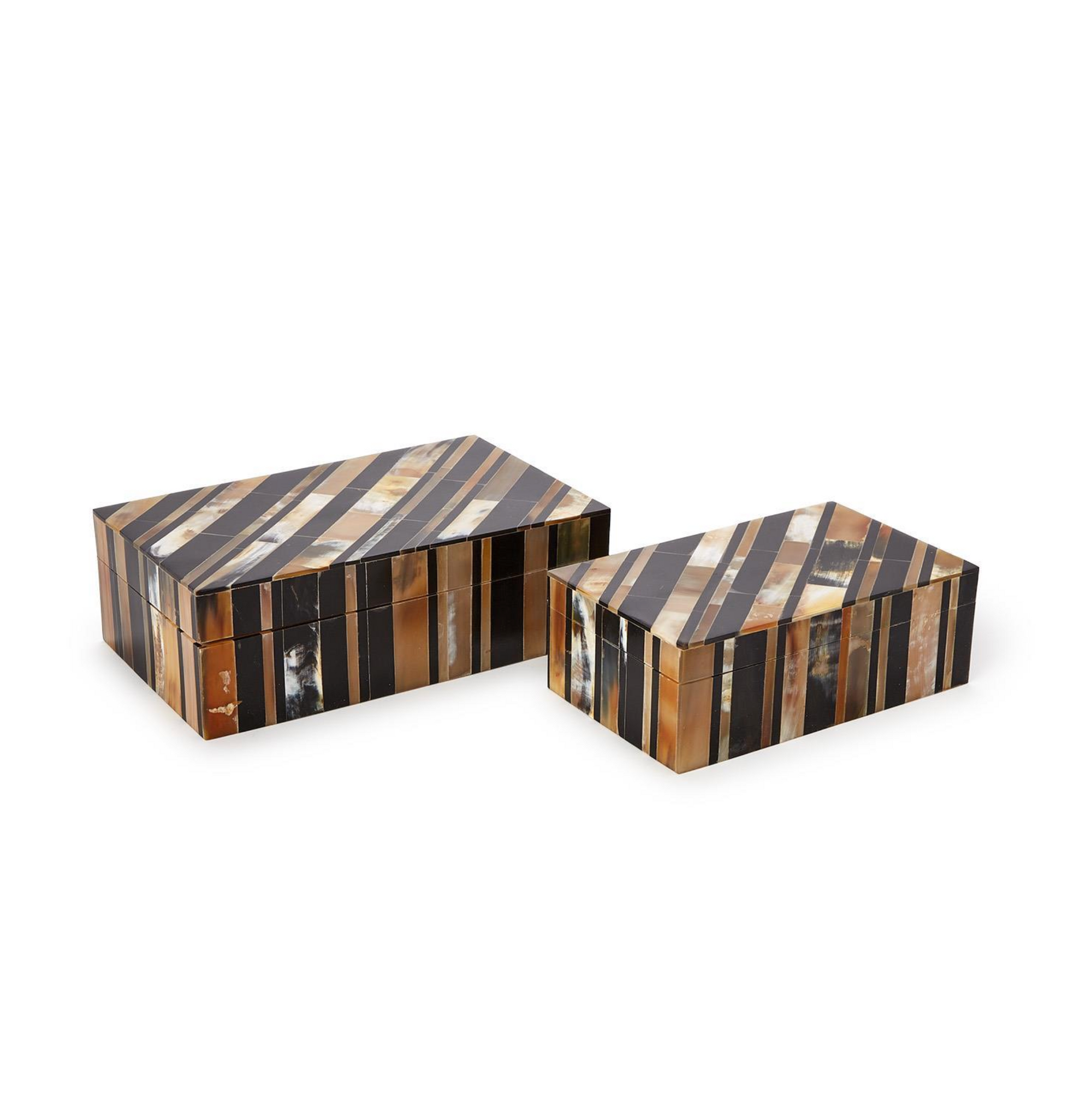 The Horn Covered Box set by Two's Company includes two handcrafted boxes with lids, featuring diagonal stripes in brown, black, white, and tan. One box is larger than the other, making them perfect as decorative storage accents.