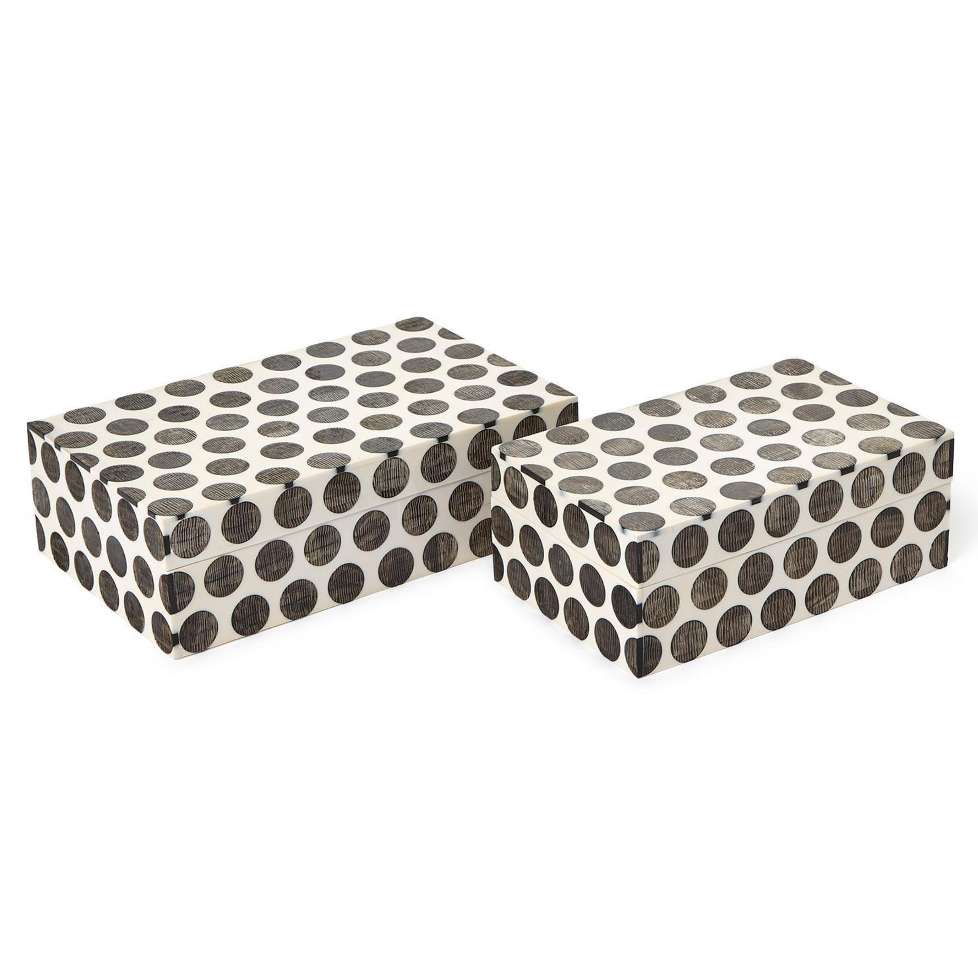 Two's Company Dot Chiseled Covered Boxes feature a white background with bold black polka dots. These handcrafted rectangular boxes—one slightly larger—offer stylish resin storage or make striking horn-inspired decorative accents for any space.