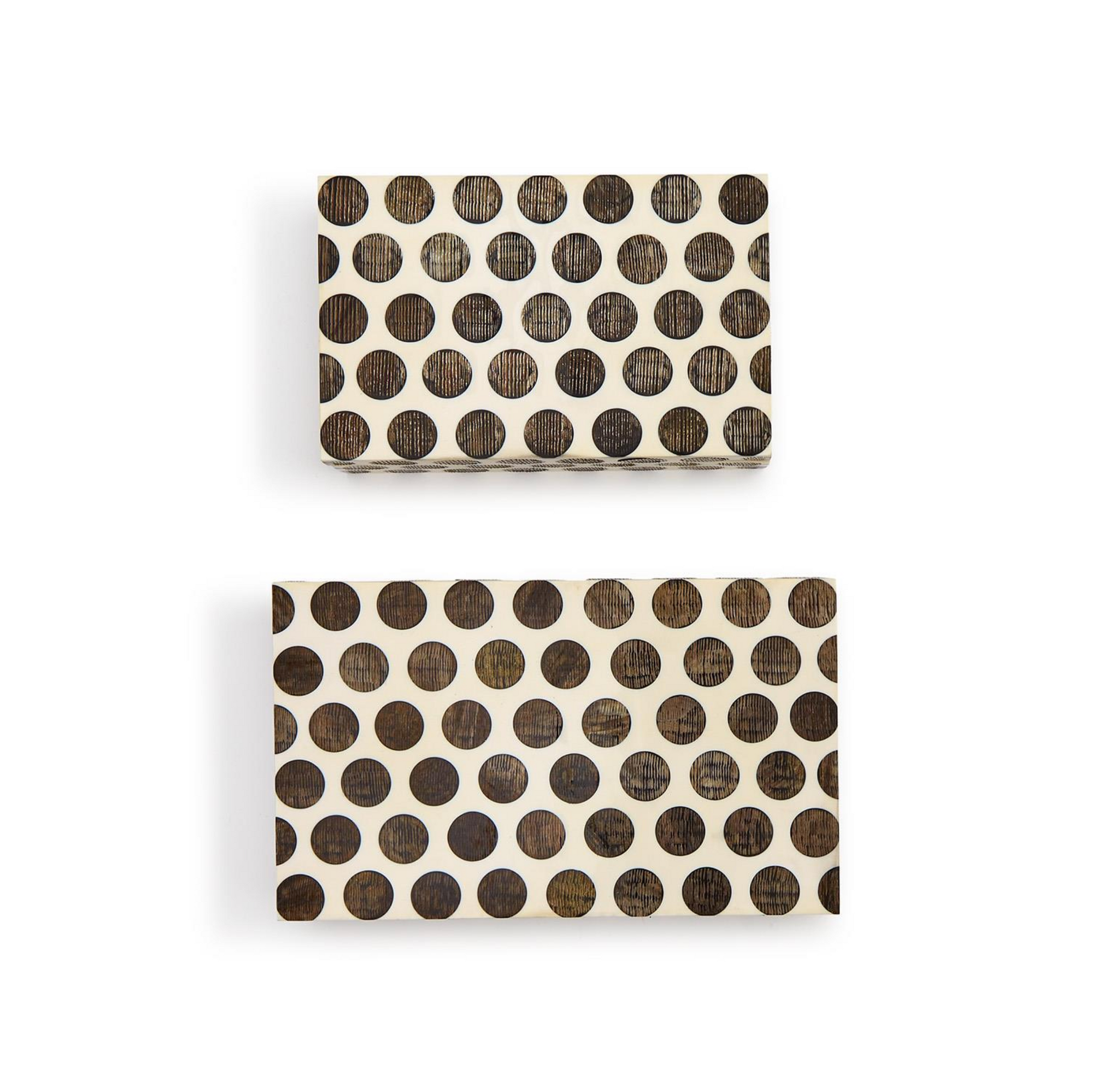 Two's Company Dot Chiseled Covered Boxes, handcrafted and rectangular, feature cream paper with large black polka dots. Shown stacked on a white background, the boxes are different sizes.
