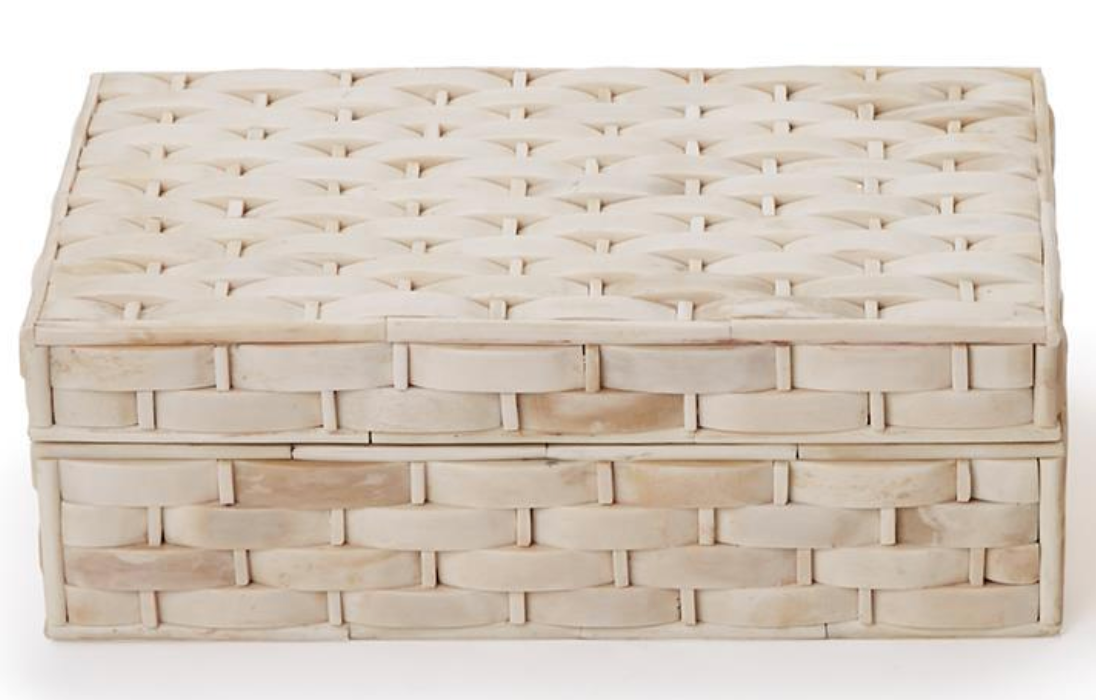 The Basketweave Bone Box by Two's Company is a rectangular box with lid, crafted from light-colored bone in a tight, glossy basket weave pattern.