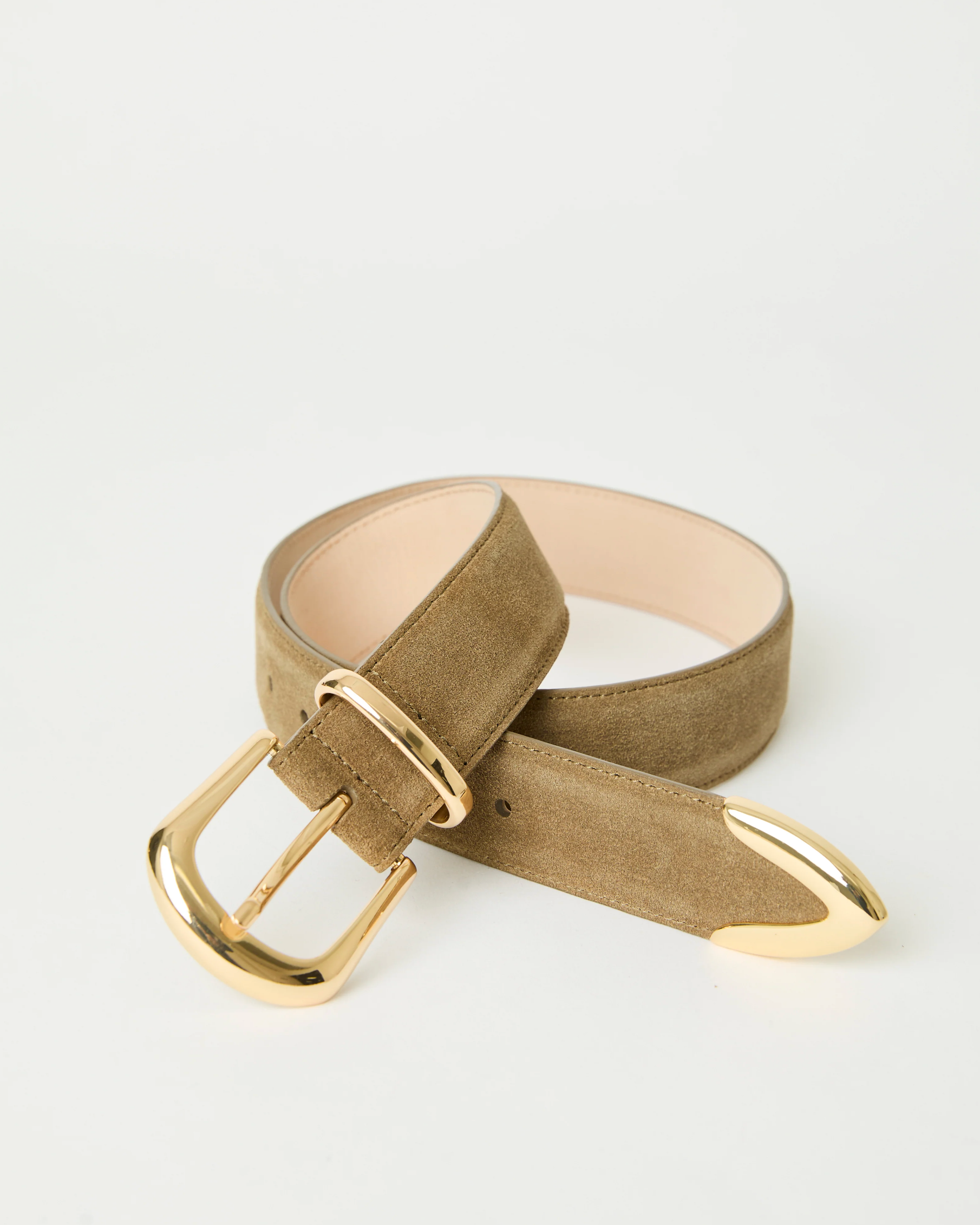 The Marc Belt by B-Low The Belt is a tan suede hip belt made from calfskin leather, featuring gold-tone hardware with a matching gold buckle and tip, displayed in a loose loop on a plain white background.