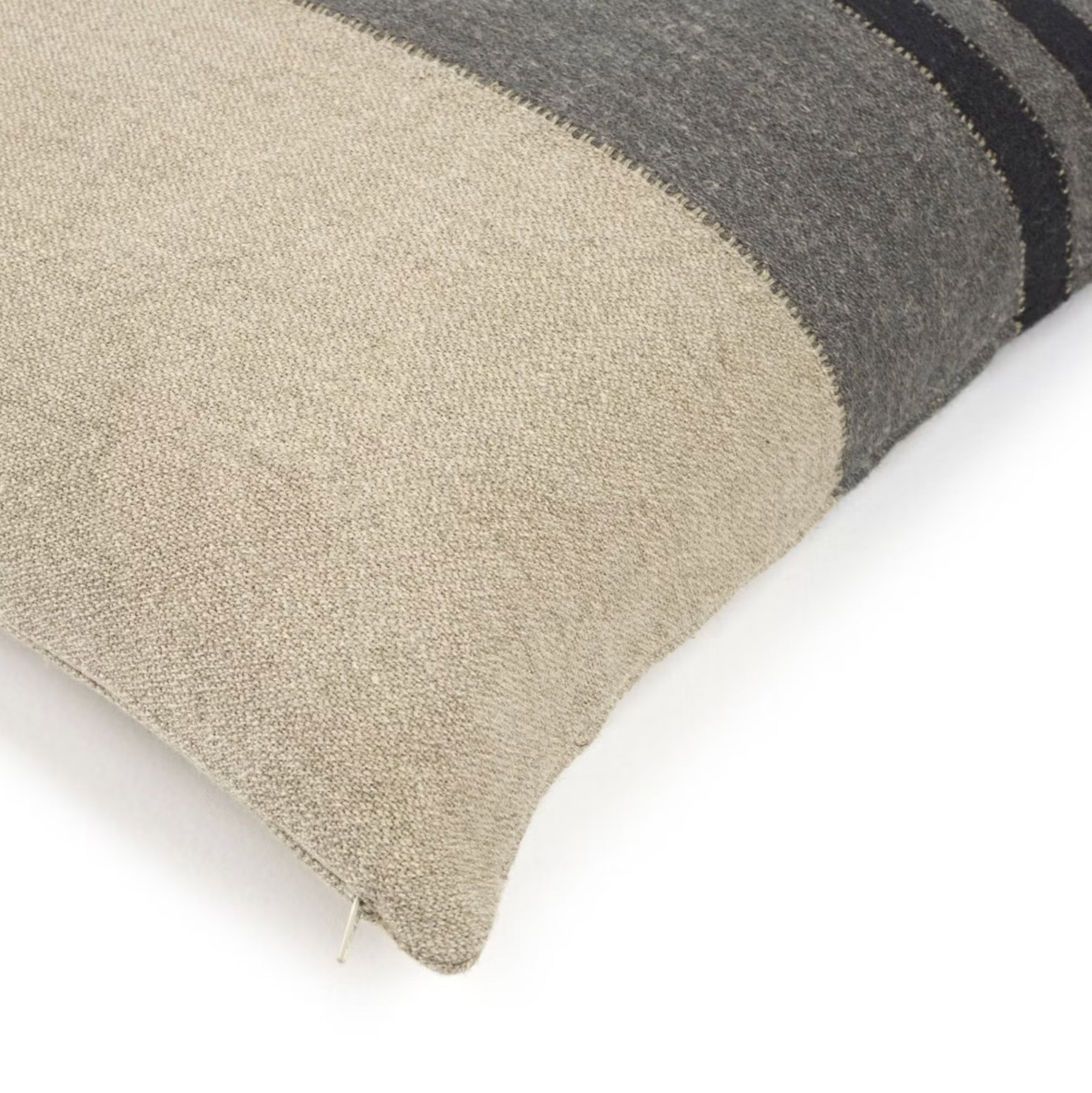 The Libeco Home Black House Stripe Pillow features a striped pattern in beige, grey, and dark charcoal with a visible zipper, shaped to fit a 25x25 insert.
