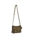 The Harry Handbag by Jerome Dreyfuss is a small olive green goatskin crossbody with a long adjustable strap, front flap closure, decorative stitching, and two gold-studded front pockets.