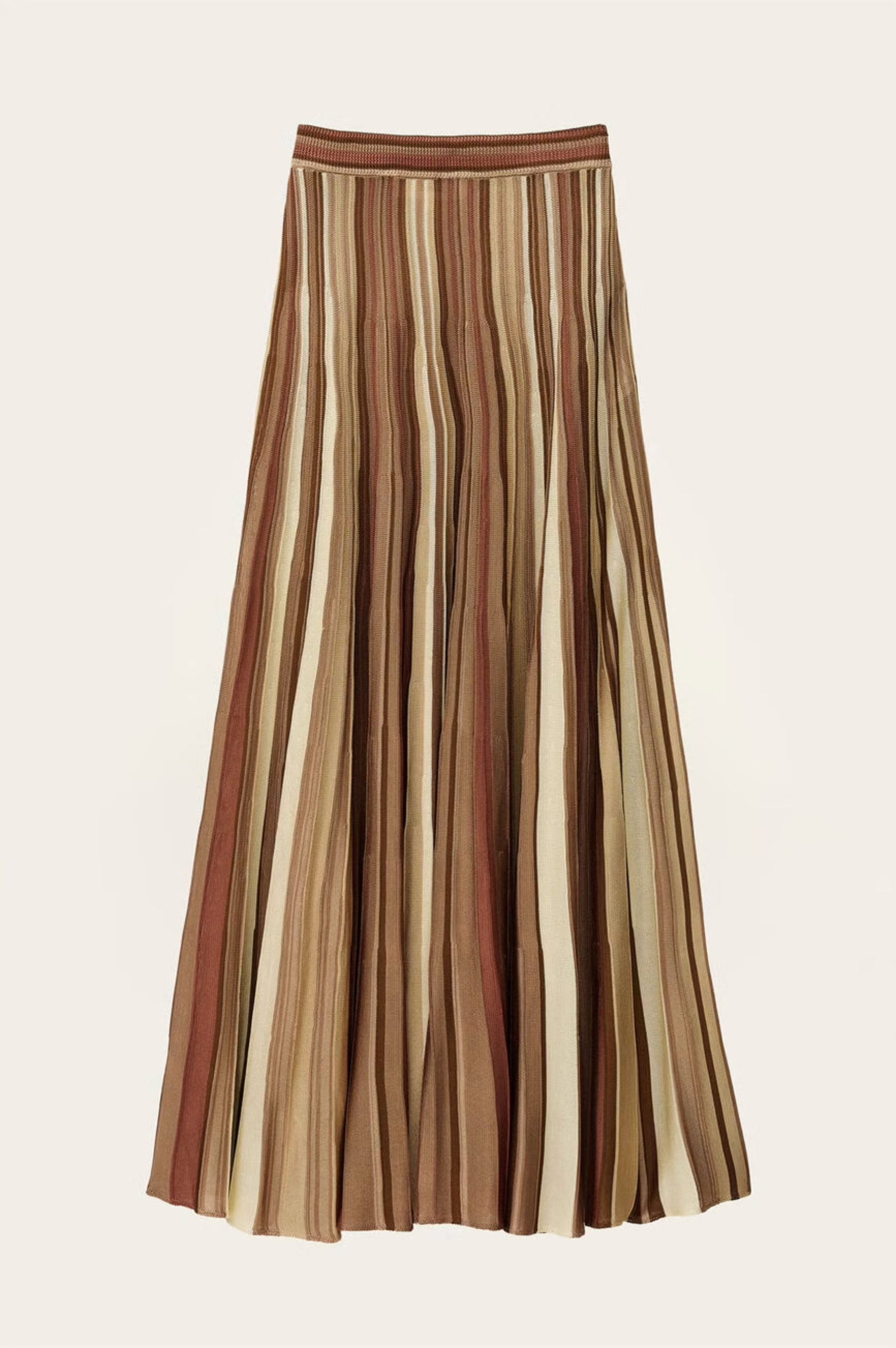 The Rima Skirt by BA&SH is a long maxi knit skirt with vertical brown, beige, and cream stripes, made from 100% viscose. It features a fitted waistband and flared silhouette for an elegant, flowing look.