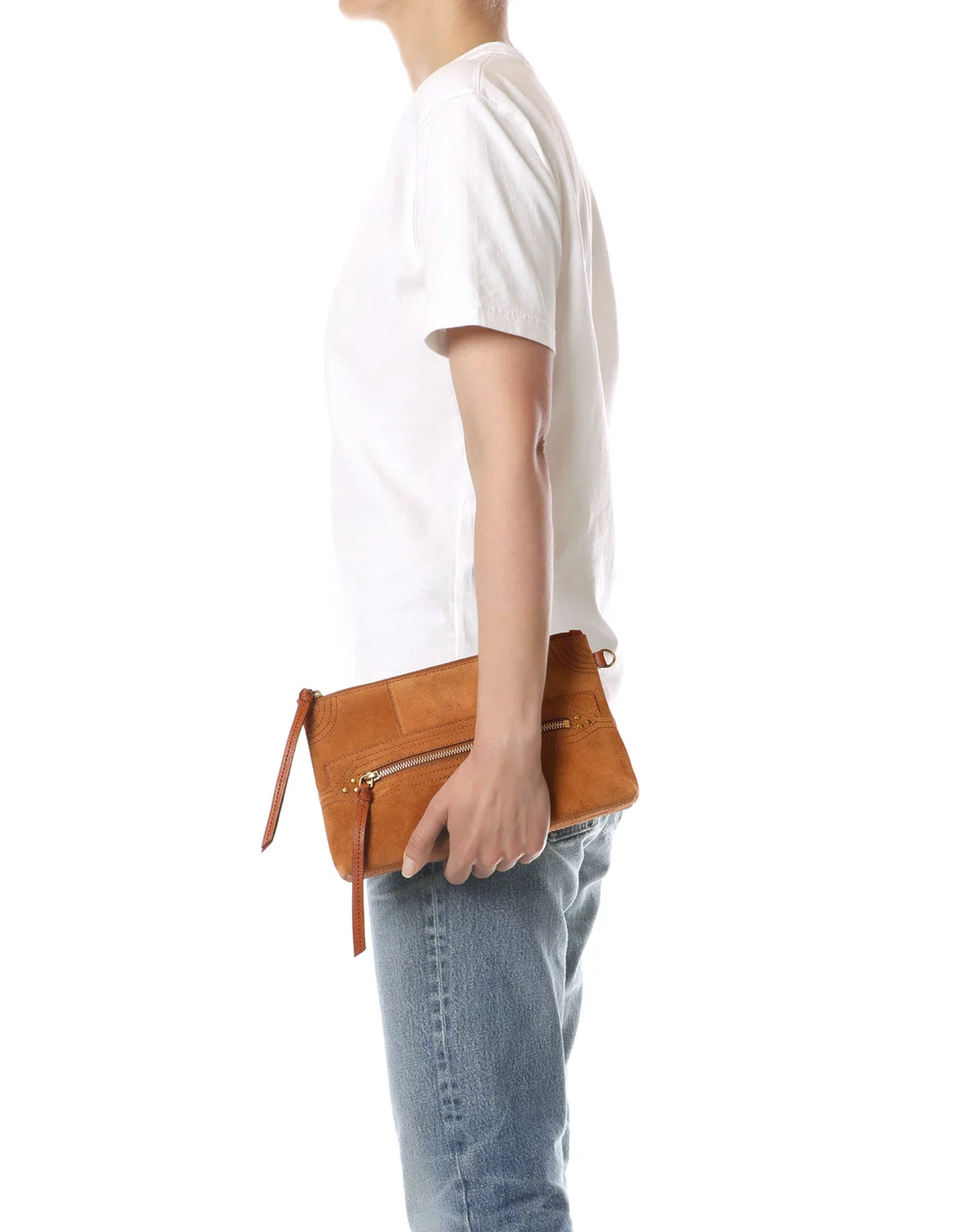 Jerome Dreyfuss Lucky Clutch L in hand, styled with casual white tee and jeans against a minimalist backdrop.