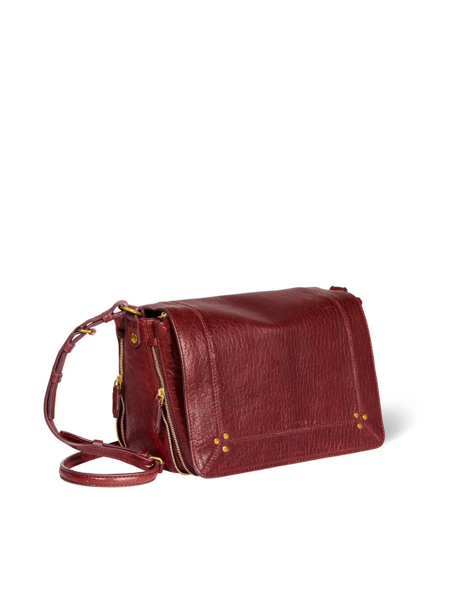 Maroon lambskin bag with gold hardware and adjustable strap by Jerome Dreyfuss, style Igor.