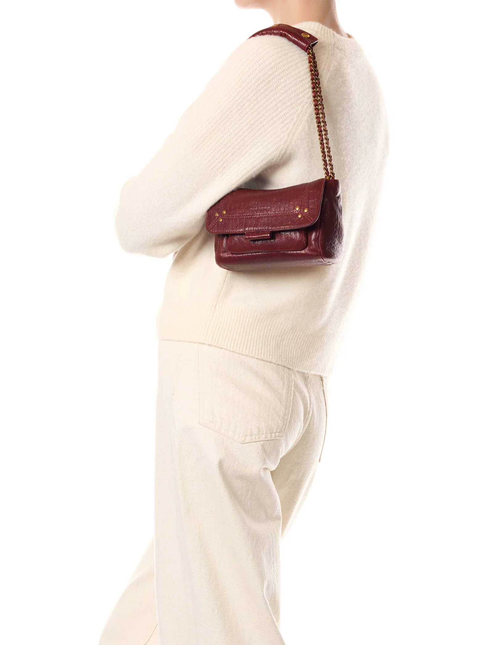Jerome Dreyfuss Lulu Small Bag styled with a cream sweater and pants against a minimalist white background.