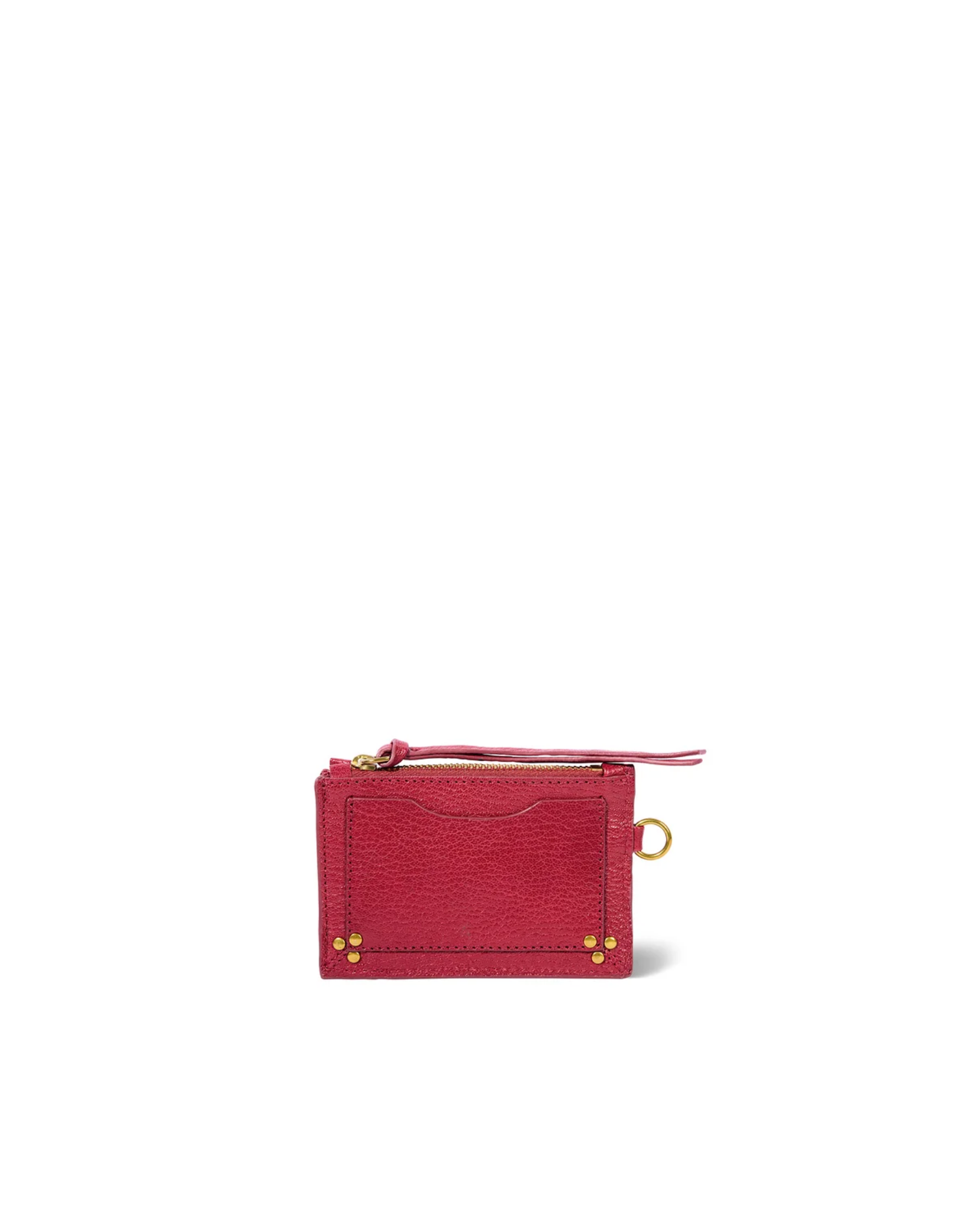 Red leather cardholder with gold rivets, seven slots, zip pocket, and key ring by Jerome Dreyfuss.