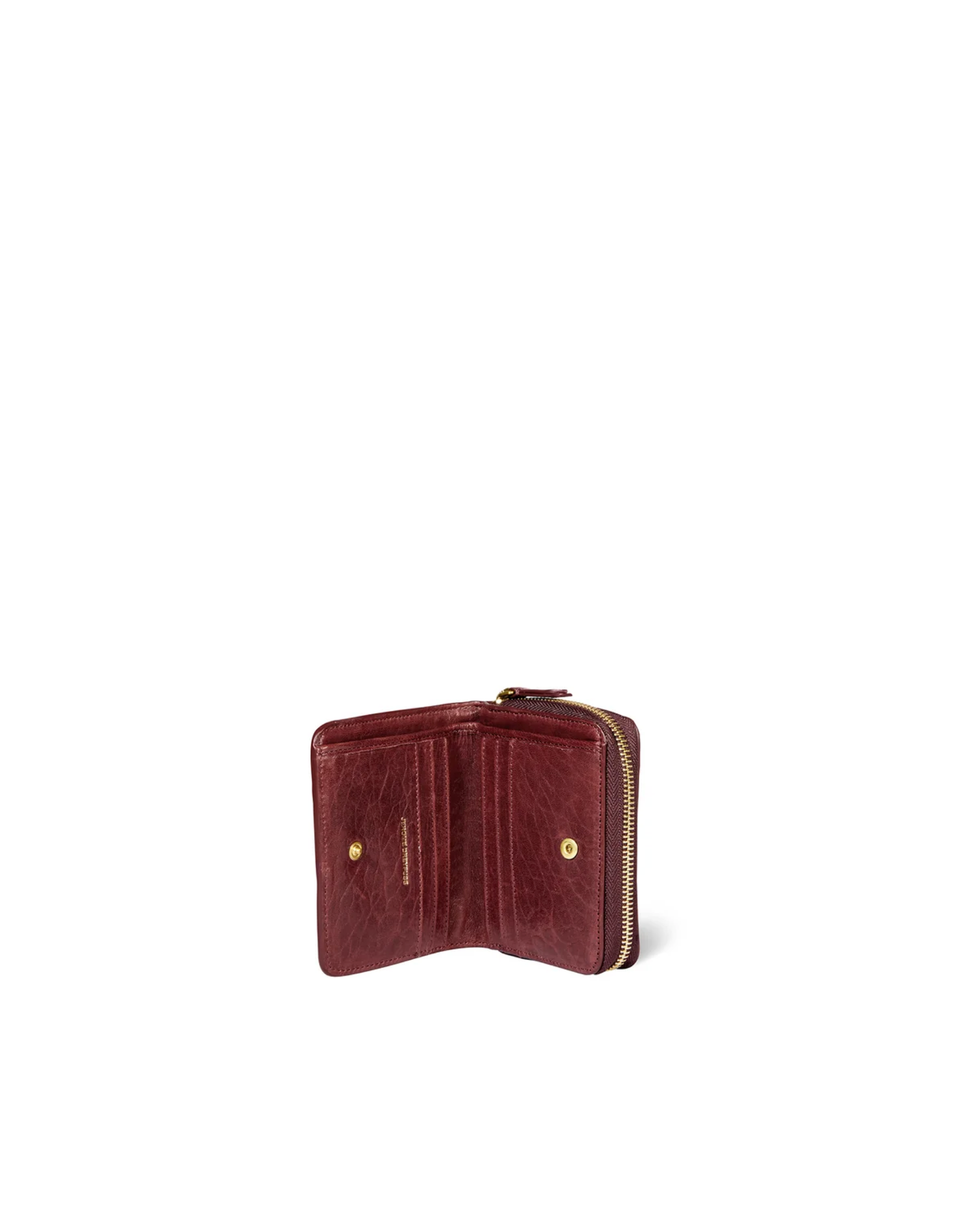 Compact maroon goat leather wallet with gold zipper, card slots, and coin compartment by Jerome Dreyfuss.