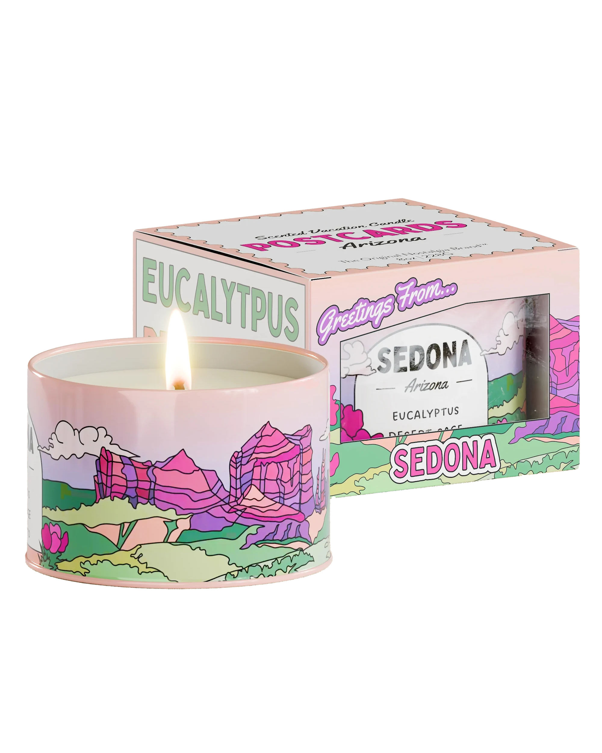 A lit candle labeled &quot;Postcards Candle&quot; by Postcards with the scent &quot;Eucalyptus.&quot; The candle container and packaging feature an illustrated landscape of Sedona, Arizona, including pink mountains, green fields, and cacti. The box reads &quot;Greetings From... Sedona, Arizona,&quot; capturing the serene beauty reminiscent of the Grand Canyon.