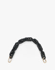 The Clare Vivier Shortie Strap S24 is a black resin chain strap with gold-tone brass spring links and D-rings at both ends, shown against a plain white background.