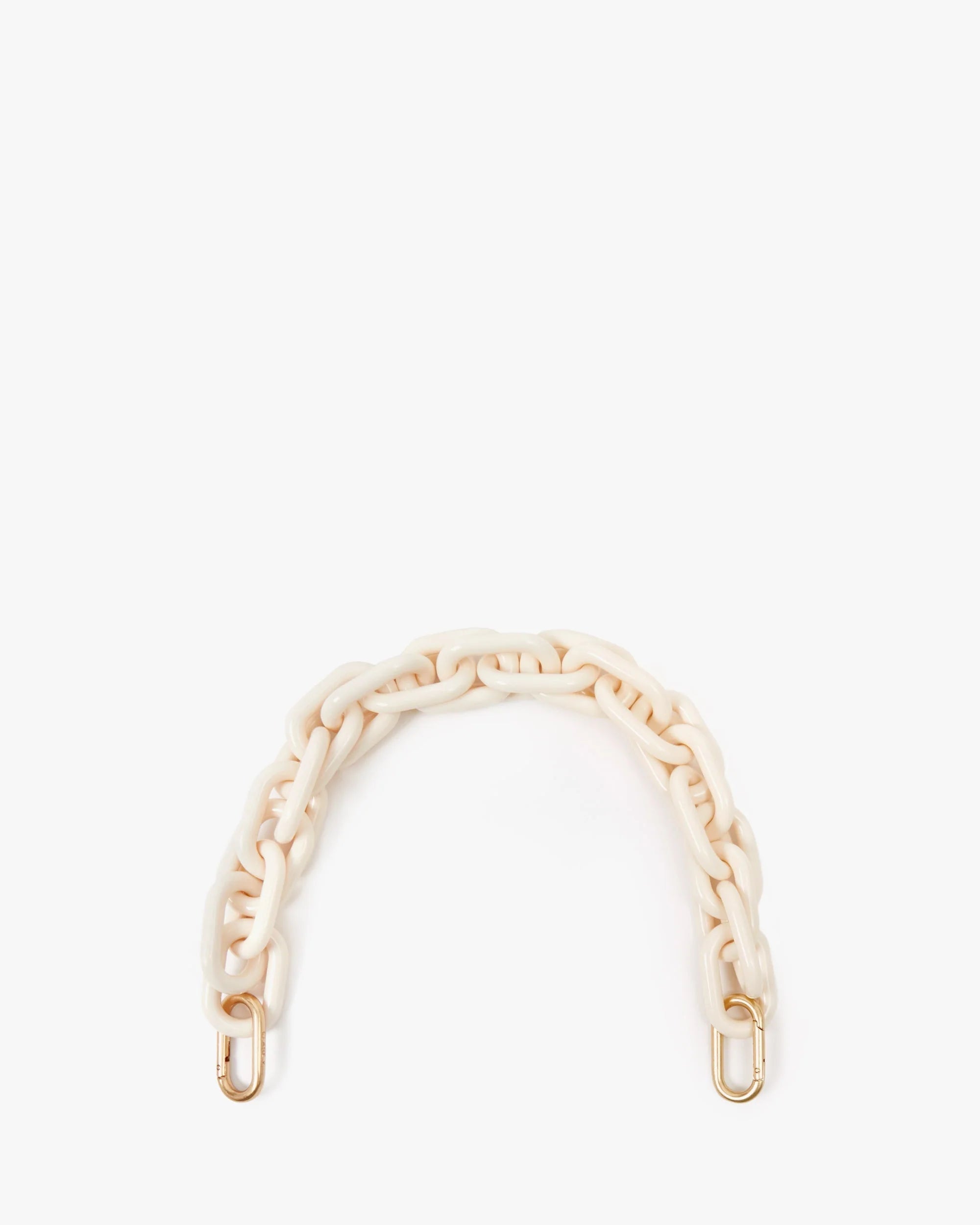 The Clare Vivier Shortie Strap S24 is a short, chunky cream resin chain strap with gold clasps for easy attachment to bag D-rings, shown on a plain white background.
