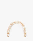 The Clare Vivier Shortie Strap S24 is a short, chunky cream resin chain strap with gold clasps for easy attachment to bag D-rings, shown on a plain white background.