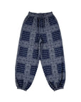 Navy pants with white bandana print, balloon legs, elastic waist and cuffs by Hunter Bell NYC.