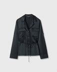 Black silk long-sleeve blouse with buttons, chest pockets, and adjustable waist by Rag & Bone.