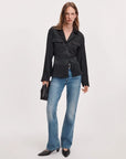 Rag & Bone Sonny silk blouse in soft ivory, styled with blue jeans and black pointed shoes, urban casual look.