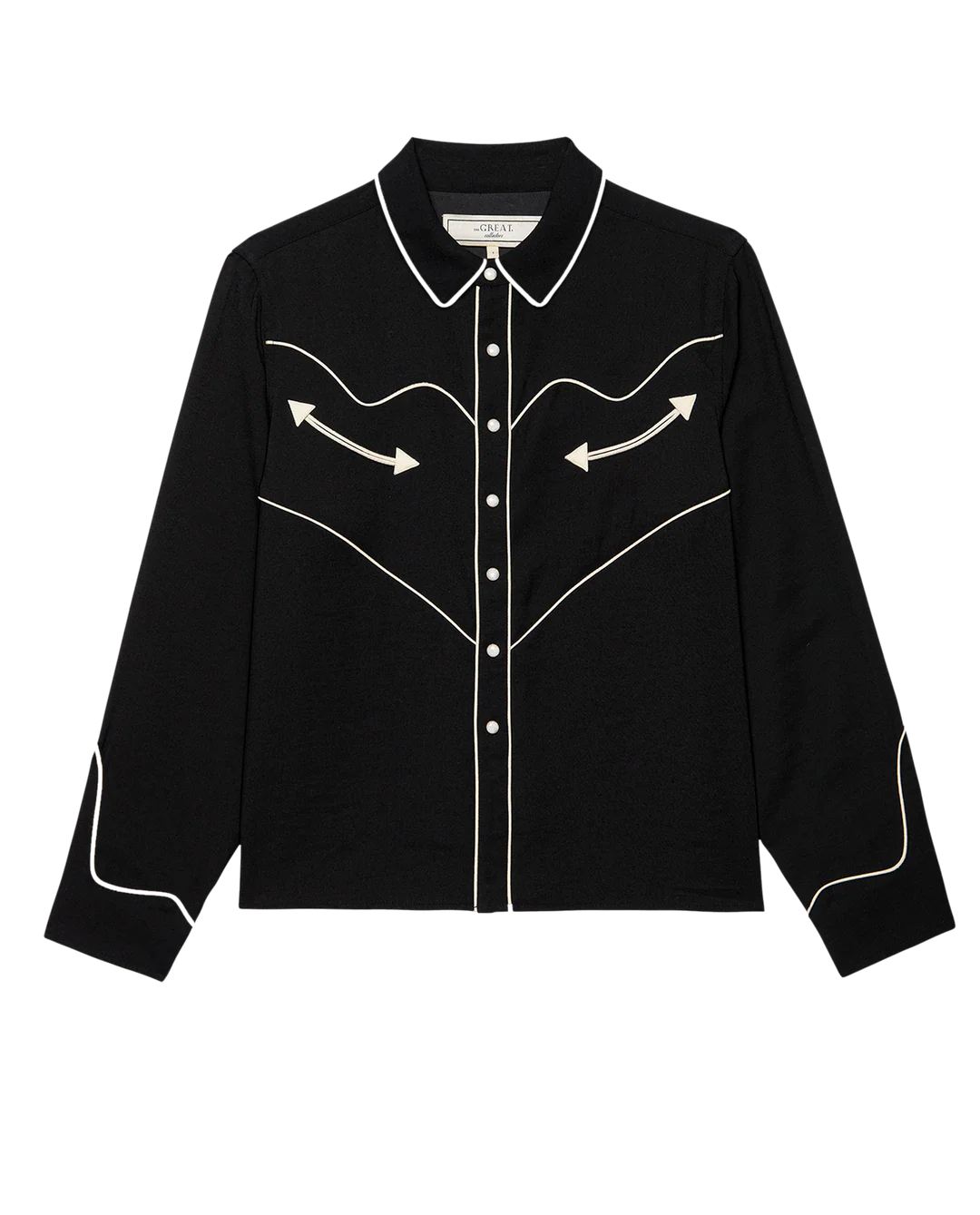 The Great Inc. The Western Shirt features black long sleeves, pearl snaps, white piping, a pointed collar, and arrow chest accents, shown on a plain white background.