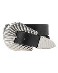 The Great Inc.'s The Big Buckle Belt, in black top-grain leather, features a large silver fluted buckle with wing-like ridged designs on the buckle and tip, shown coiled against a white background.