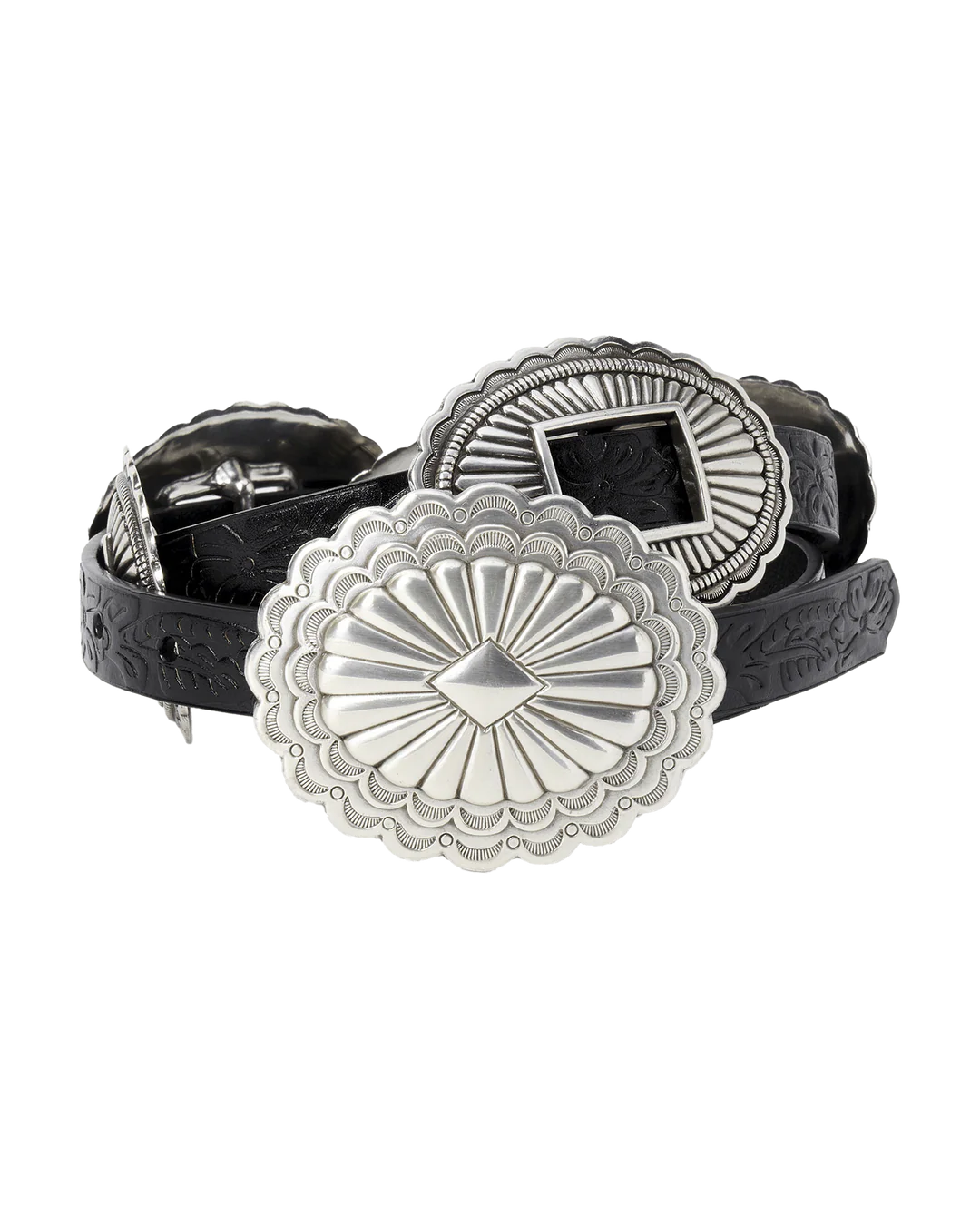 The Great Inc. Leather Concho Belt features top-grain leather with intricate embossing, large ornate silver conchos, and an engraved buckle, highlighting fine Western craftsmanship against a white background.