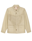 The Great Inc.'s The Leather Fringe Jacket features beige leather, a pointed collar, button front, flap pockets, and V-shaped fringe detailing across the chest for an authentic western look.