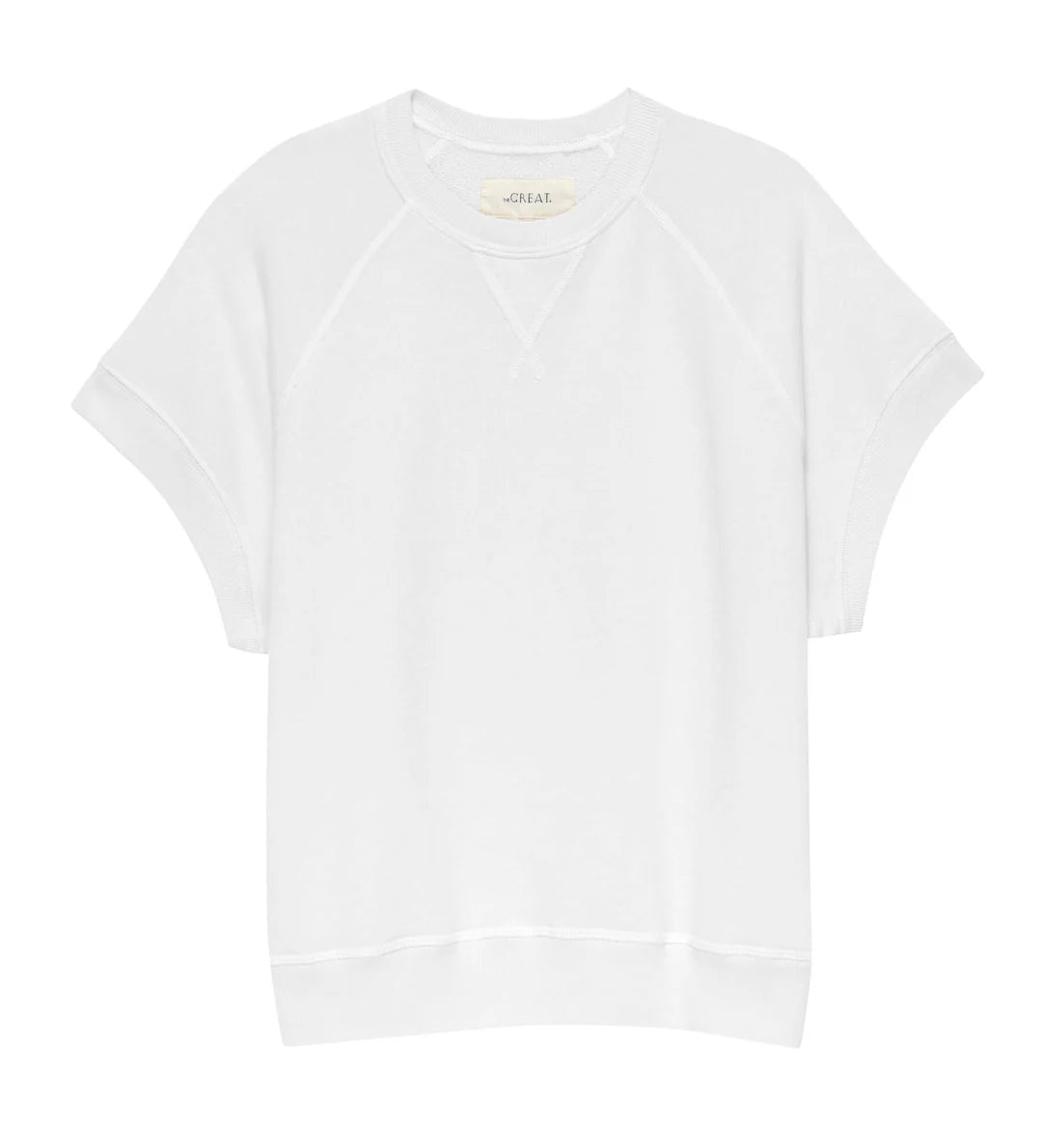 The Great Inc. presents The Wedge Sweatshirt—a plain white, oversized sweatshirt with raglan sleeves and a crew neckline, offering a relaxed fit and vintage-inspired style, displayed on a white background.