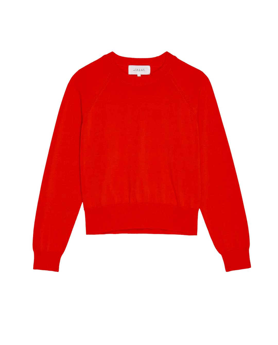 The Great Inc.'s The Crew Neck Sweater is a vibrant red, long-sleeved, high-twist cotton piece. Displayed on a plain white background, it features a classic design with ribbed cuffs and hem for a cozy feel.