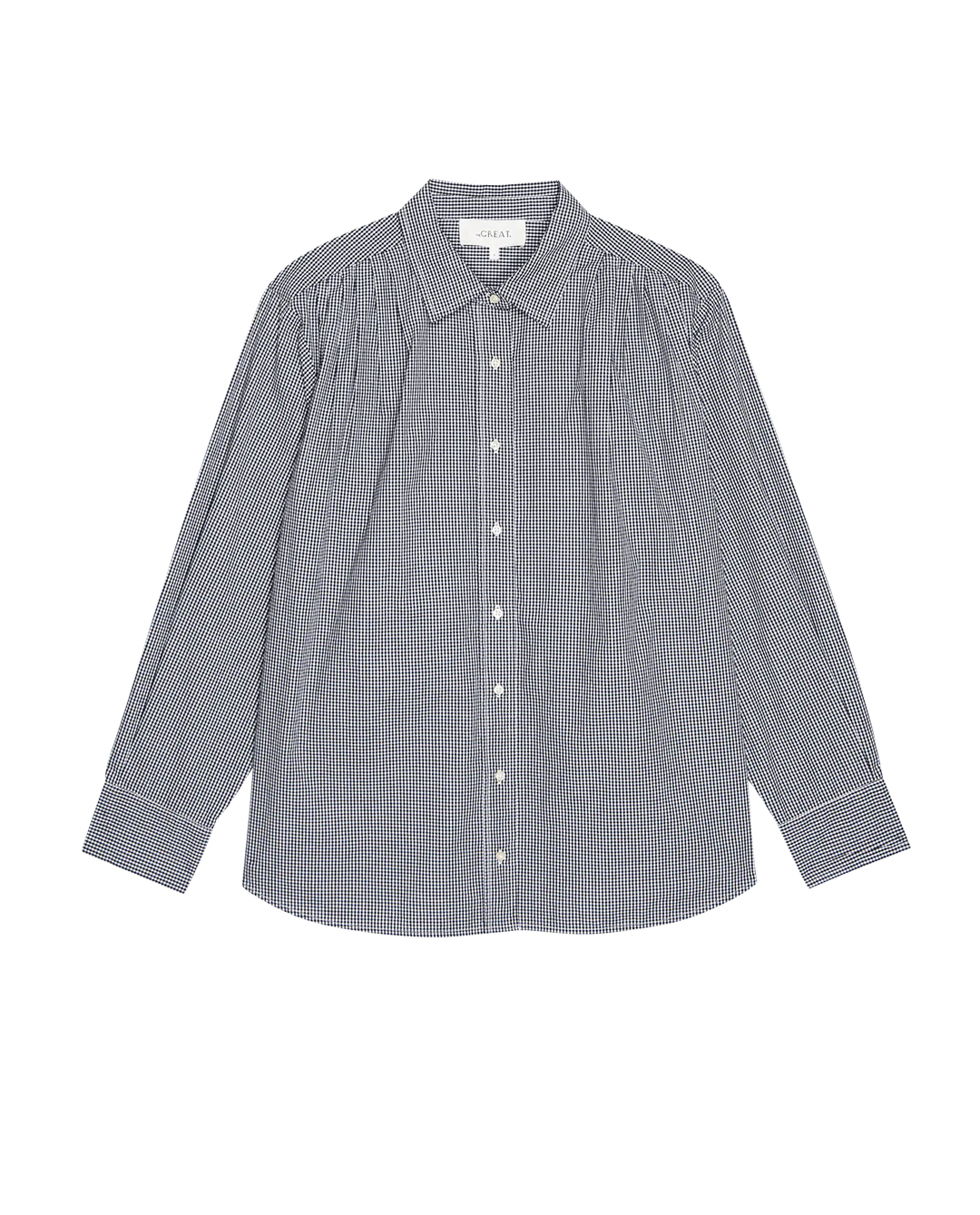 The Society Top by The Great Inc. is a black and white gingham button-up shirt featuring long sleeves, a classic collar, and gathered shoulder detailing. Add chic style to your wardrobe and pair it as part of a matching set for an effortlessly stylish look.