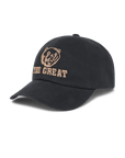 The Baseball Hat by The Great Inc. features a black design with a bear face and "THE GREAT" in tan vintage chainstitch embroidery on the front, plus an adjustable strap for a perfect fit.