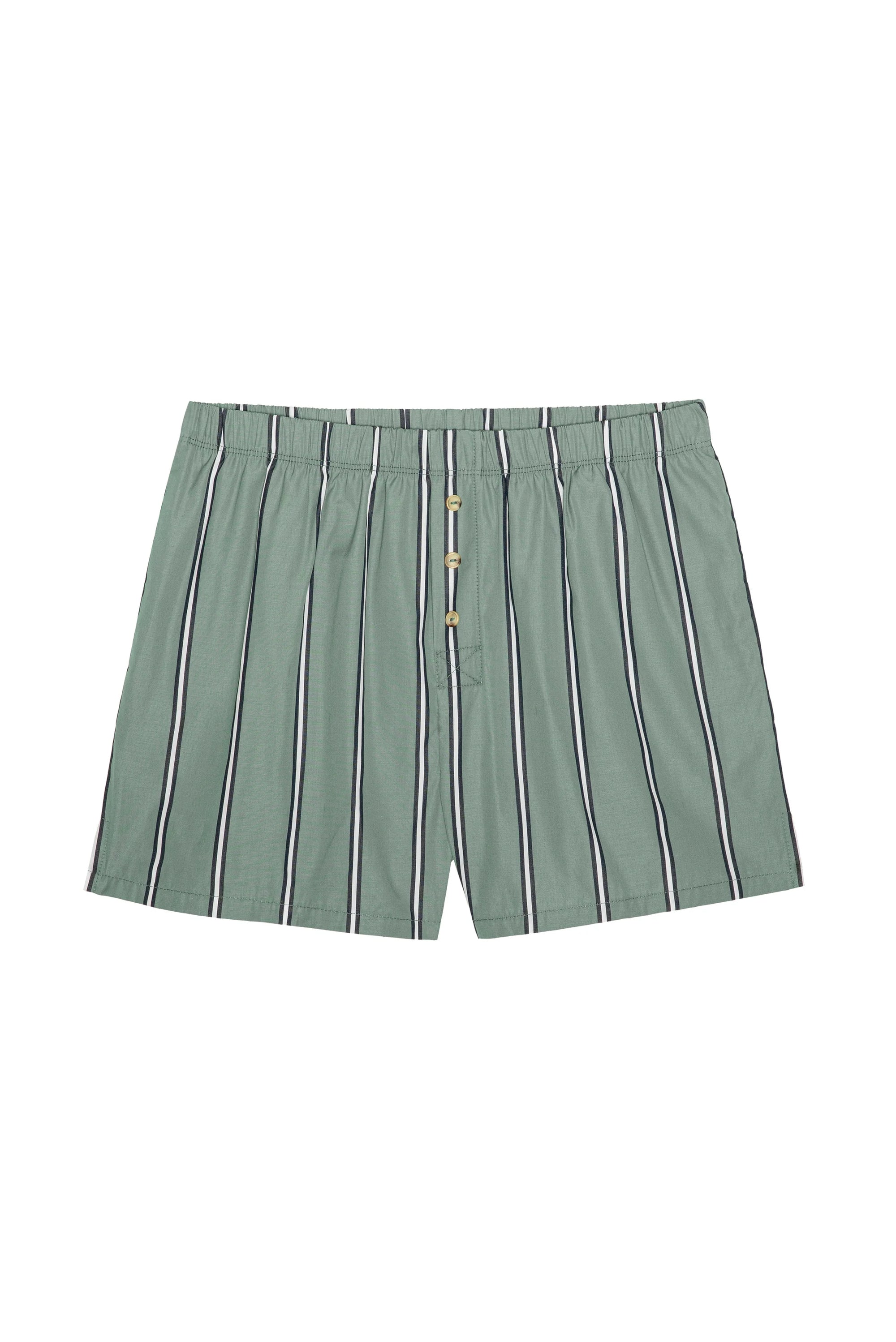 The Stripe Pop Boxer by Donni features green cotton poplin with white and black vertical stripes, an elastic waistband, and button fly. These lightweight, breathable boxers are made in Los Angeles and shown laid flat on a white background.
