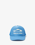 The Clare Vivier Trucker Hat Les Sardines features a blue design with a white fish illustration and "Libérez les sardines" text on the front. It has an adjustable closure, mesh back for comfort, sun protection, and is an ideal conversation starter for outdoor enthusiasts.