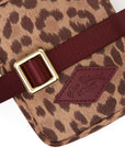 Leopard print crossbody bag with maroon strap and gold buckle by The Upside, recycled polyester.