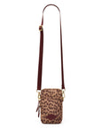 Leopard print crossbody bag with maroon strap by The Upside, made from recycled polyester with multiple pockets.