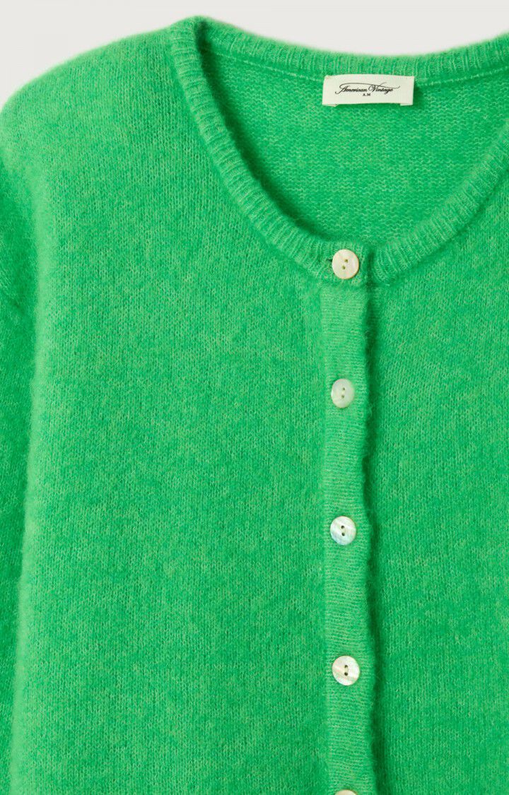 A close-up of the Vitow Cardigan by American Vintage, crafted from premium knitwear in green. It features a round neckline, five light-colored buttons, and a small white label sewn into the collar.