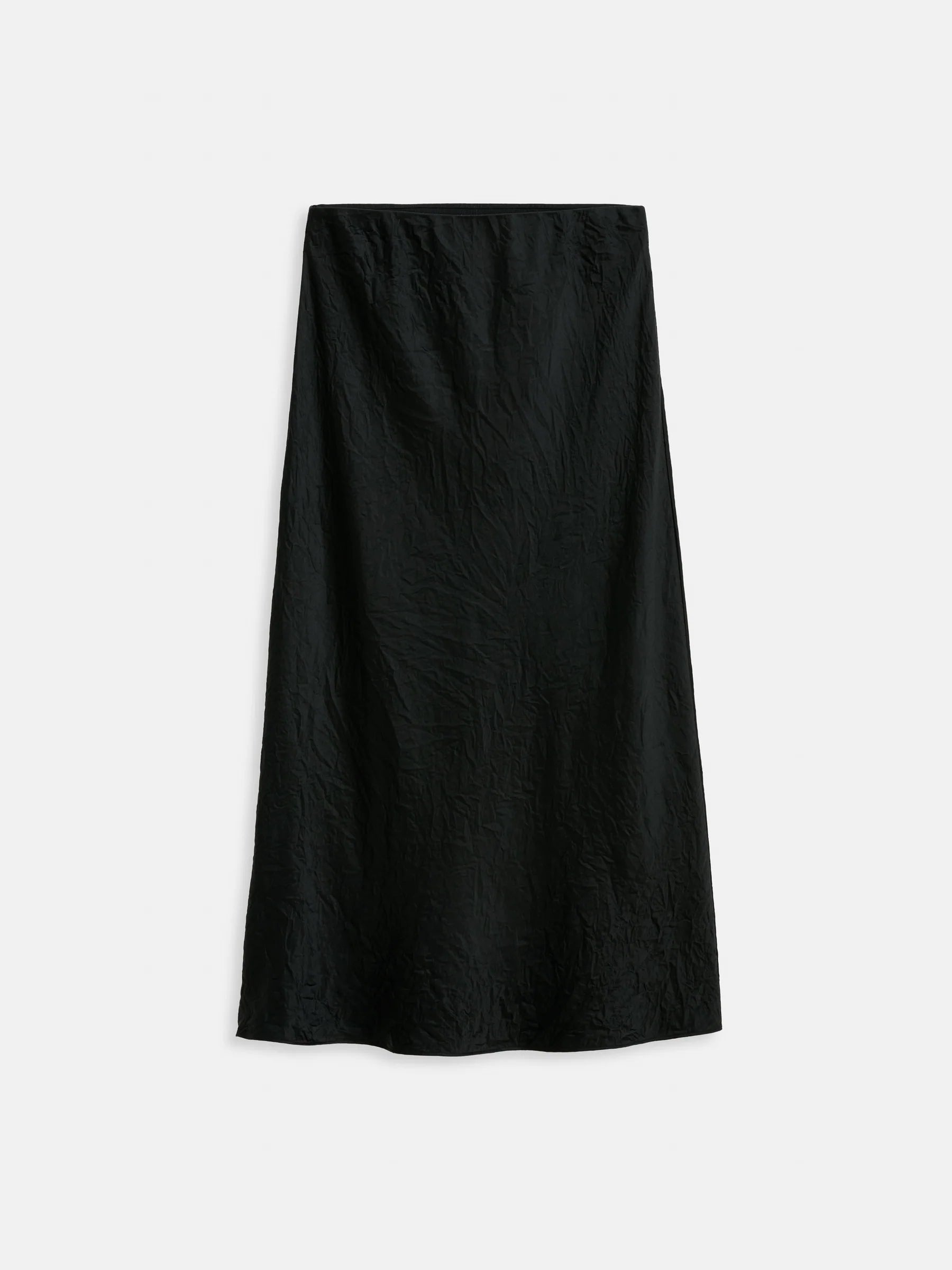 The Claire Skirt by Alex Mill is a plain black, midi-length bias-cut piece with a subtle crinkled texture and pull-on waist, shown against a white background—ideal for seamless day-to-night looks.
