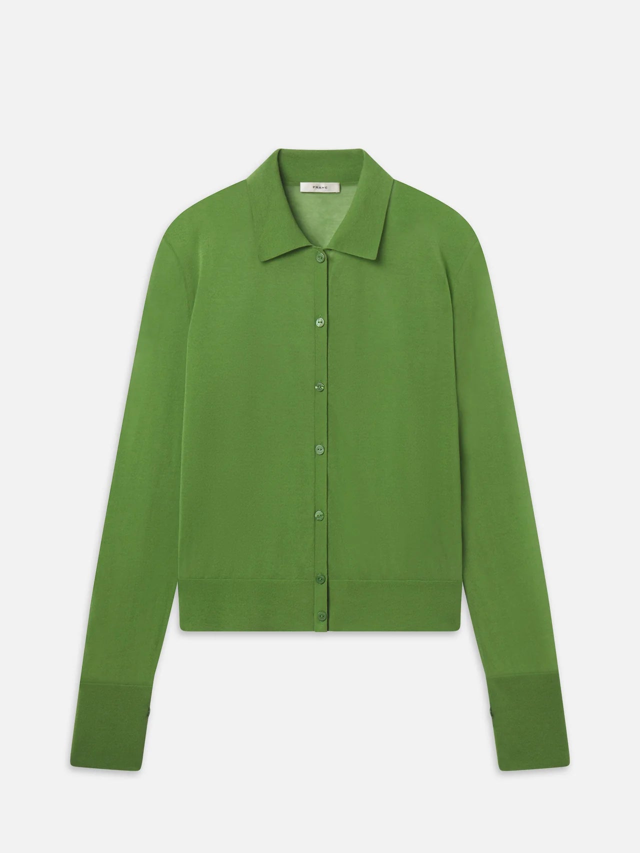 The Collared Cardi by FRAME is a lightweight, long-sleeve, button-up cardigan in a solid green cotton blend, shown laid flat on a white background.