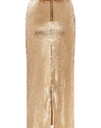 The Liza Skirt by Le Superbe is a gold sequin midi with a high waist, front zipper and slit, offering a chic, figure-flattering fitted silhouette.