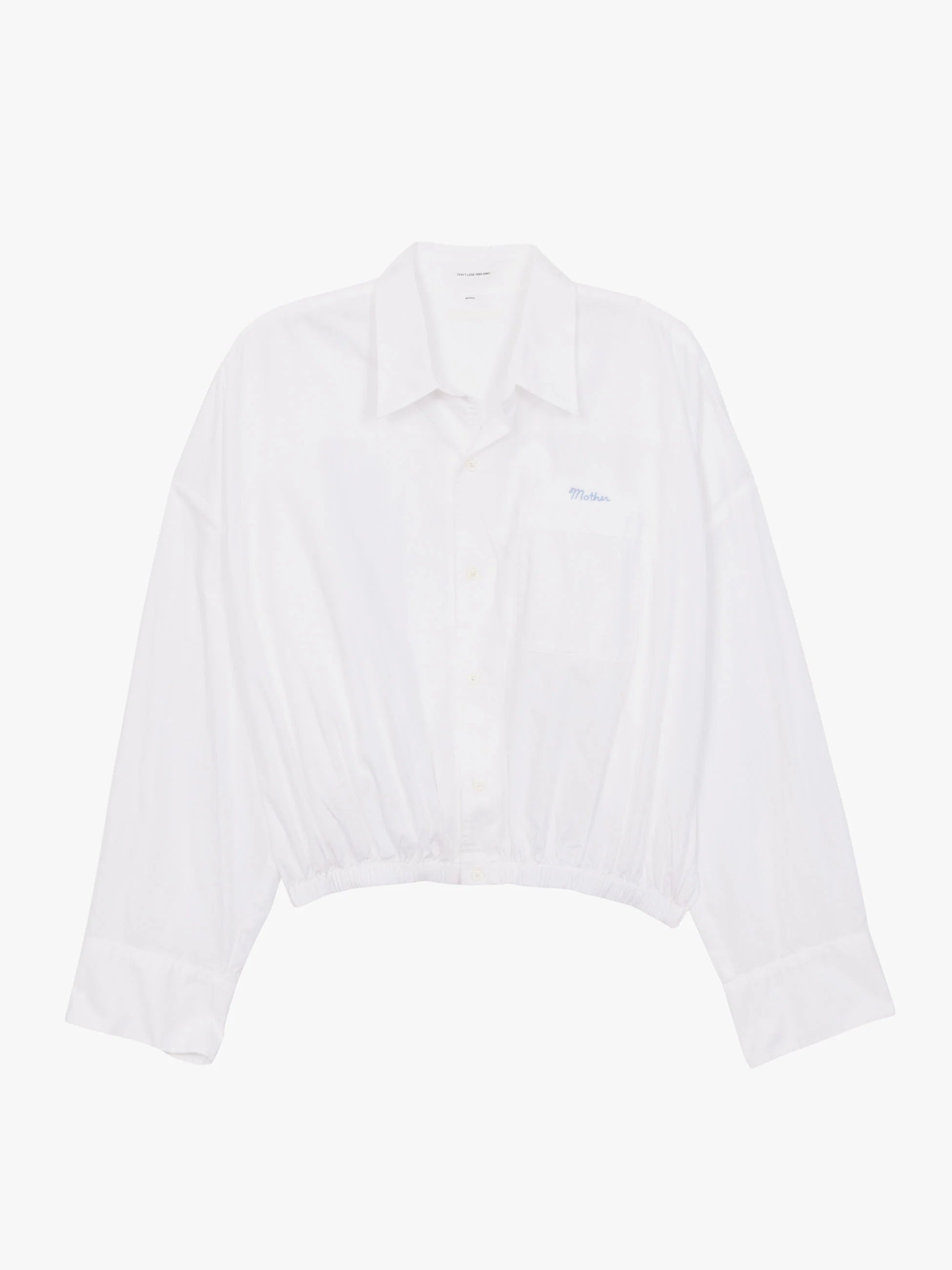 The Scrunchie Frenchie by Mother is a white cropped button-up shirt with long wide sleeves, a collared neckline, front chest pocket, and an elasticized hem, shown laid flat on a plain white background.