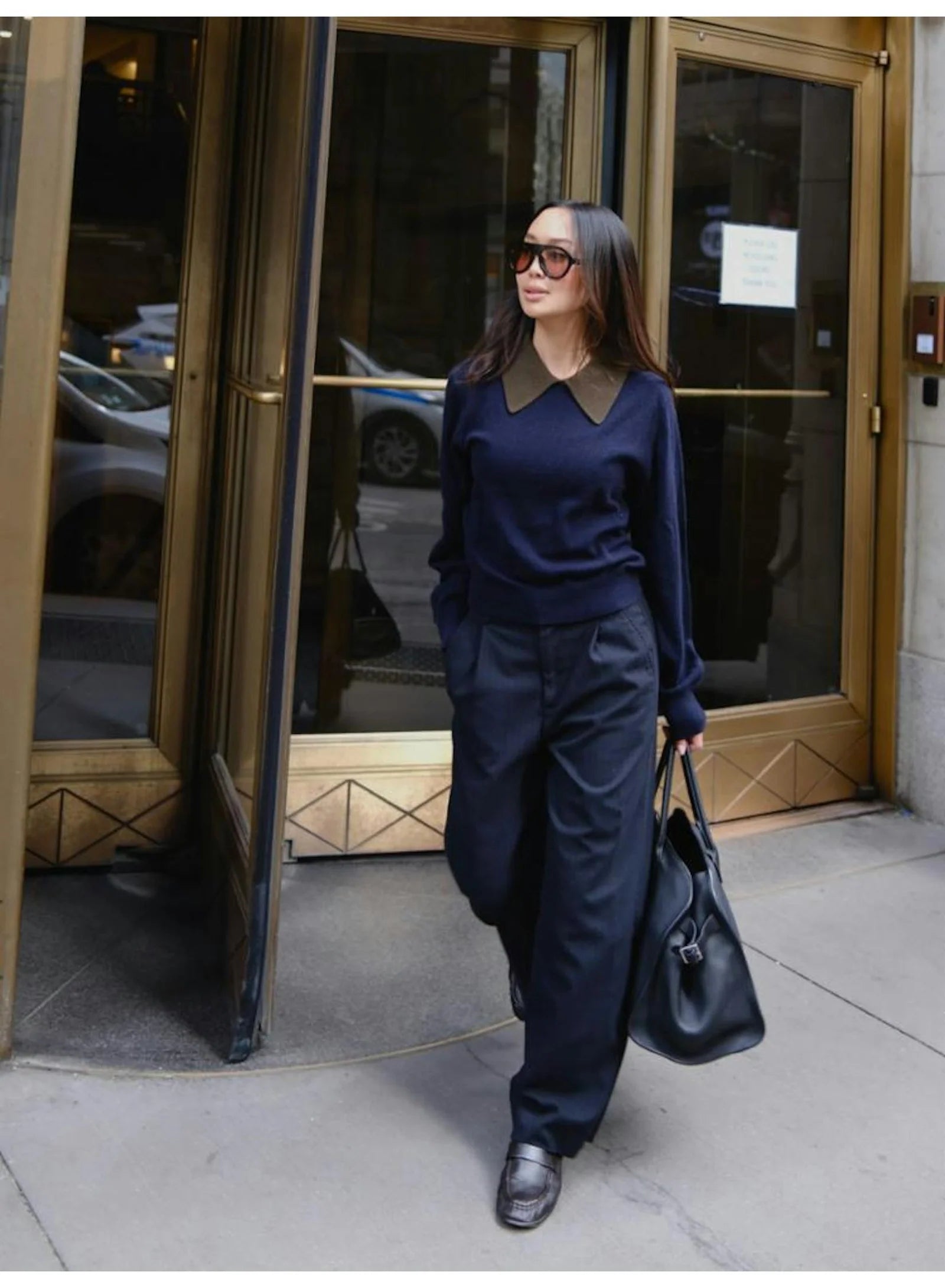 Cashmere contrast collar sweater by White + Warren styled with sunglasses and wide pants outdoors.