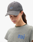 Clare Vivier wool baseball hat with oui text, cozy winter accessory in dark fabric at Bungalow Furniture & Accessories.
