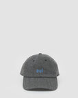 Gray herringbone wool baseball hat with small blue oui text on front by Clare Vivier shown on a plain background.