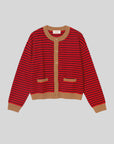 The Xirena Lillian Cardigan is a classic stripe knit with red and black horizontal stripes, tan cuffs, hem, button placket, and pocket trim, shown flat on a light gray background.