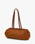The Clare Vivier Yvette Smooth Nubuck is a brown suede shoulder bag with a rectangular shape, double long leather straps, and a gold-tone clasp, shown against a plain white background.