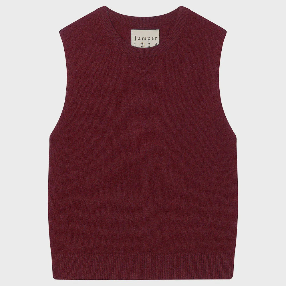 A distressed maroon tank from Jumper 1 2 3 4/CR2 is laid flat on a light background. This sleeveless jumper vest features a ribbed hem and crew neck, with an inner label that reads "Jumper 1234.